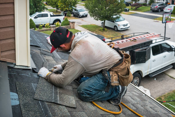 Professional Roof Replacement technician working in Waldron, IN